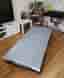 Folding bed with mattress