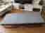 Folding bed with mattress