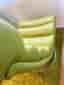 Two green leather armchairs + stool