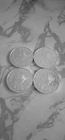 4 stycken x 1 oz österrikiska Vienna Philharmonic silvermynt