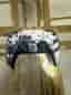 Sony Playstation 5 spelkonsol med DualSense-handkontroll svart/vit motivdesign