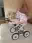 BRIO dockvagn med liggdel rosa