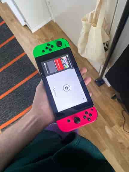 Nintendo Switch spelkonsol neonröd neonblå