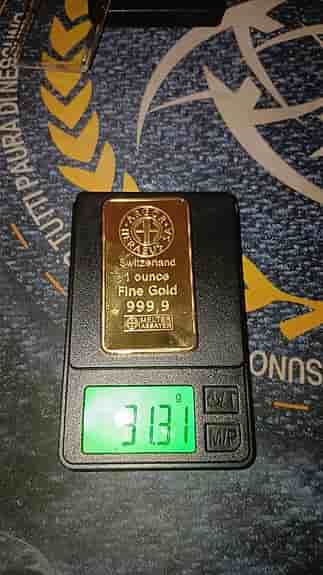 Två helt nya 1oz 999.9 guldtackor mycket välgjorda