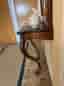 Gammal spegel med bord i mahogny