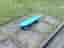 Blått pennyboard skateboard
