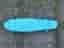 Blått pennyboard skateboard
