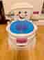 Fisher-Price spelande potta