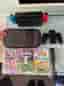 Nintendo Switch V2 256GB + Mario Kart + Animal Crossing + FC25