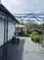 Svart metallpaviljong / pergola till altan