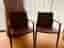 A pair of Mio armchairs