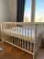 Unused Baby Crib with Mattress and Sheets