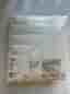 Unused Baby Crib with Mattress and Sheets
