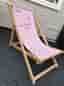 Solstol i trä med rosa "sits"