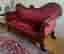 EN VIKTORIANSK SNIDAD MAHOGNY SHOWFRAME SOFFA