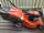 Husqvarna gräsklippare bensin orange
