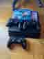 Sony PlayStation 4 spelkonsol med handkontroller och spel