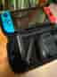 Nintendo Switch spelkonsol med blå/röd Joy-Con