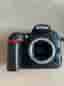 Nikon D7000 systemkamera med två objektiv och tillbehör