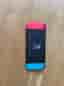 Nintendo Switch spelkonsol neon röd/blå