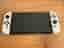 Nintendo Switch OLED + 2 spel och fodral