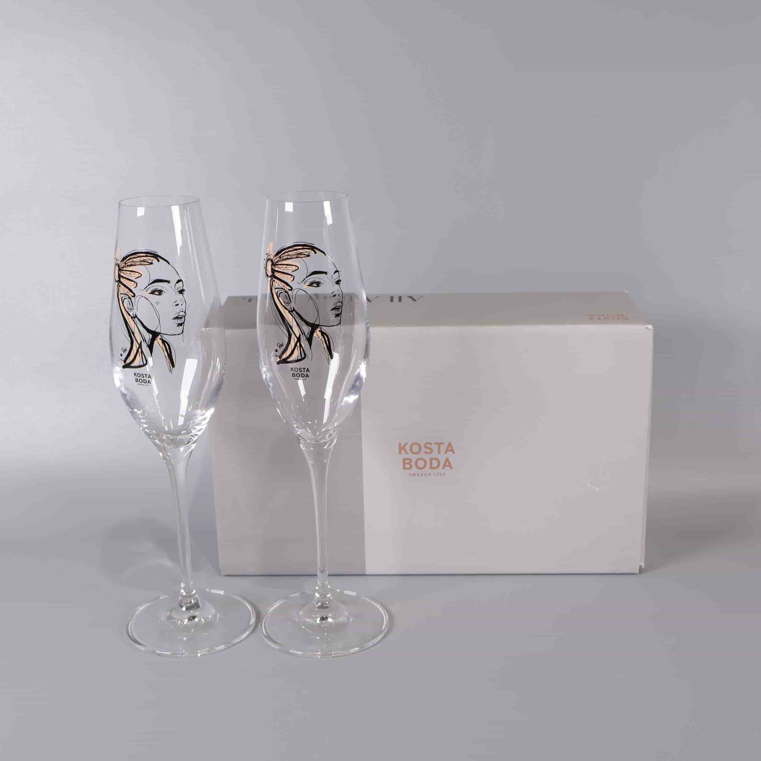 Kosta Boda - Sun Kiss - Sara Woodrow - Champagneglas med konstmotiv