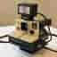 Polaroid Supercolor 1000 Land Camera med Nissin blixt