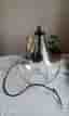 Taklampa i glas och svart metall