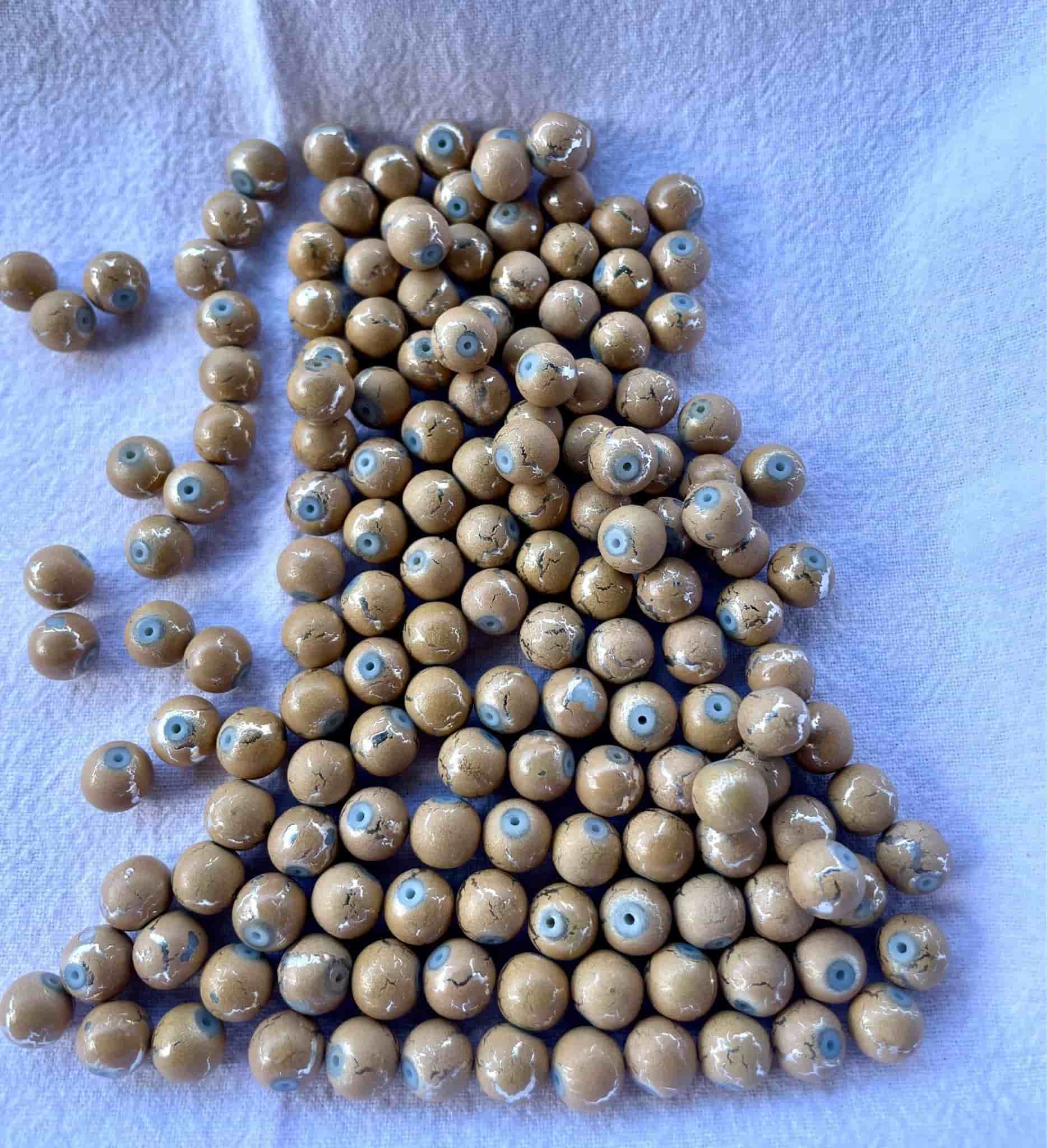 En påse med 119gram pärlor, 8mm