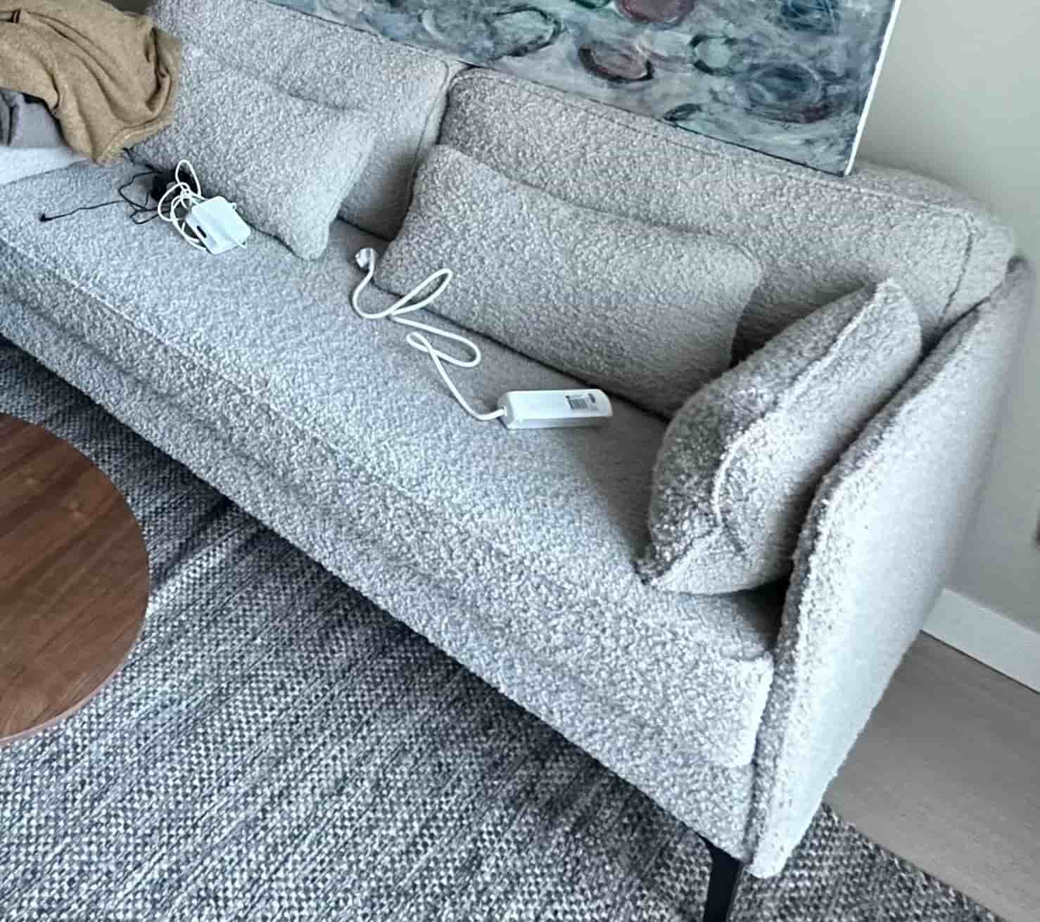 Soffa i bouclétyg