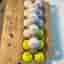 Golfbollar Titleist TruFeel gula vita 16 stycken