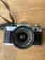 Canon AE-1 Program Analog Systemkamera with Multiple Lenses