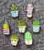 7 cactus pins i kawaii-stil