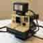 Polaroid Supercolor 1000 Land Camera med Nissin blixt