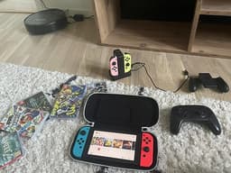 Nintendo Switch-paket + extra kontroller, spel och tillbehö