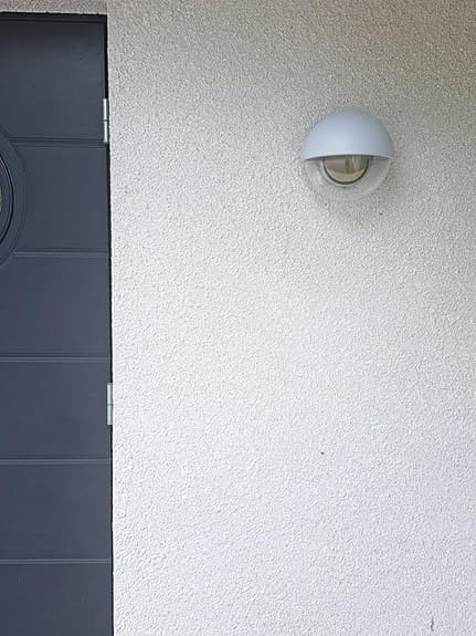 En oanvänd vacker Origo utomhus väggbelysning - vit