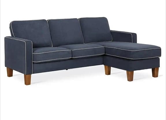 Bowen hörnsoffa i L-form med kontrastkant i blå chenile.