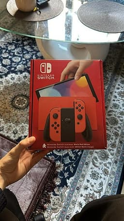 Nintendo Switch + 2 Joysticks + 2 Spel