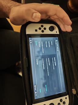 Nintendo Switch OLED Spelkonsol med vit och grå Joy-Con