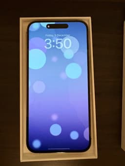 iPhone 14 Pro Max with original charger