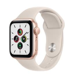 Apple Watch Series 5 (2019) GPS 44 mm - Aluminium Or - Bracelet sport Lumière stellaire