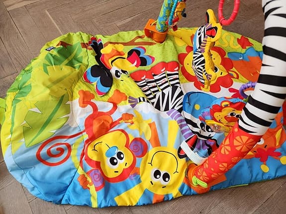 Grow n’ Play 5-in-1 Safari babygym med lekbåge