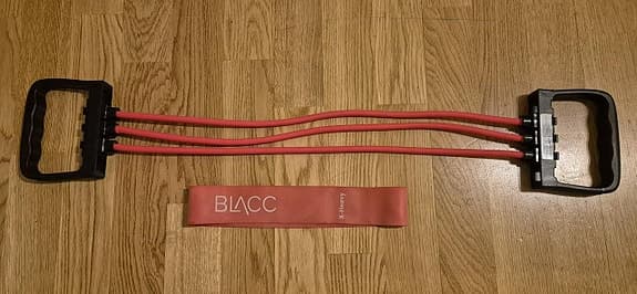 Träningsredskap gummiband och elastiskt band med handtag