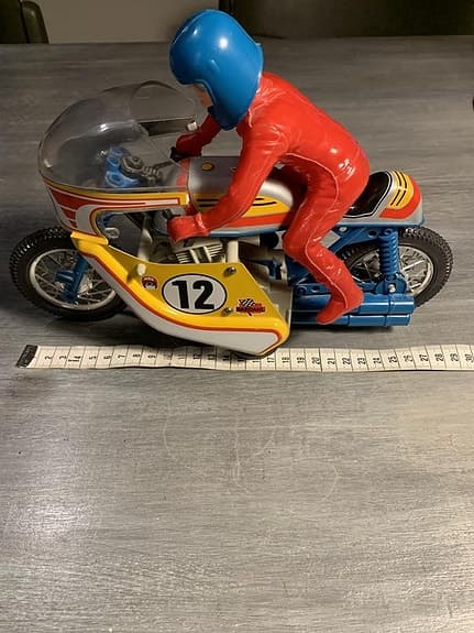 Leksaks motorcykel med förare från 1970 talet