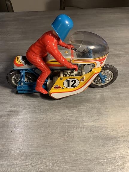 Leksaks motorcykel med förare från 1970 talet