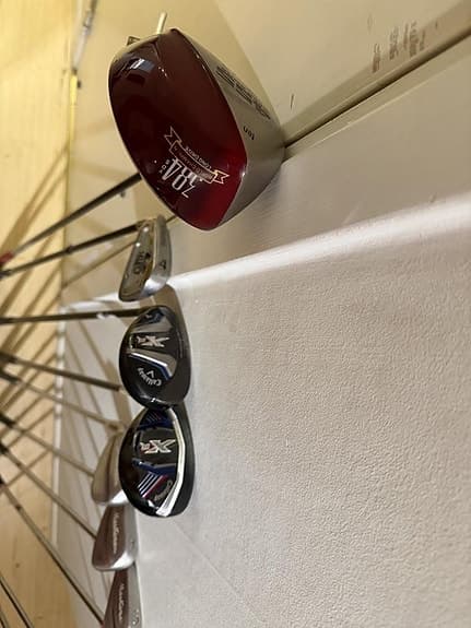 golfklubbor vänster