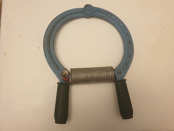 Handgreppstränare med fjädermotstånd