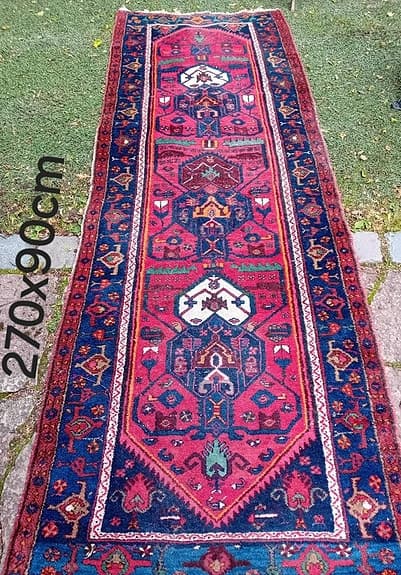 Fin handknuten matta