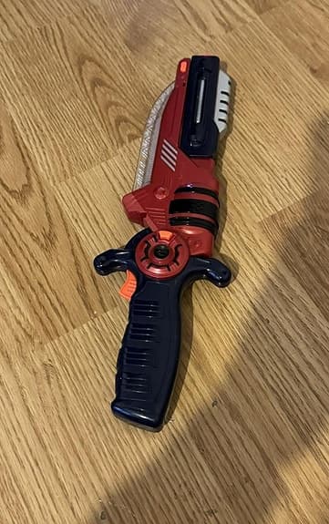 Leksaksvapen – futuristisk lasersabel/blaster