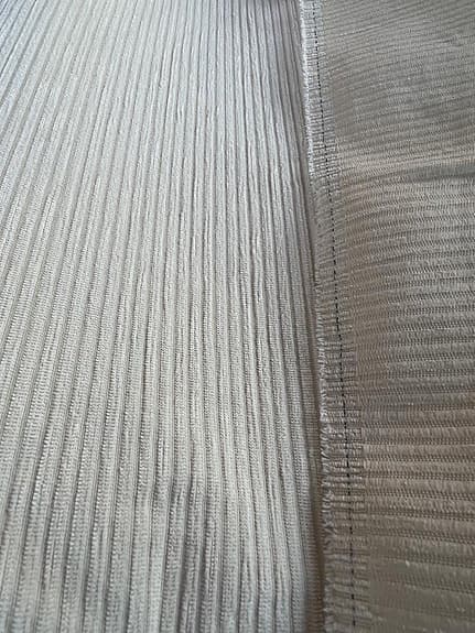 Vitt möbeltyg med manchesterstruktur